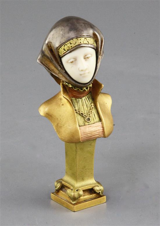 Alexandre Caron (1857-1932). An early 20th century French patinated bronze and ivory bust of a medieval lady, 4.25in., with original fi